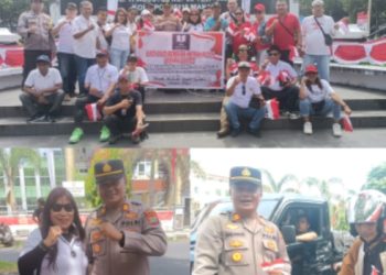FMPS Kobarkan Semangat Kemerdekaan Lewat Aksi Bagi-Bagi Bendera di depan kantor gubernur 